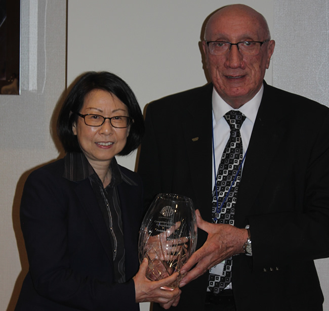 Photo: Joel Sprague receives the L David Suits Award during ASTM Committee D35 meetings in Toronto