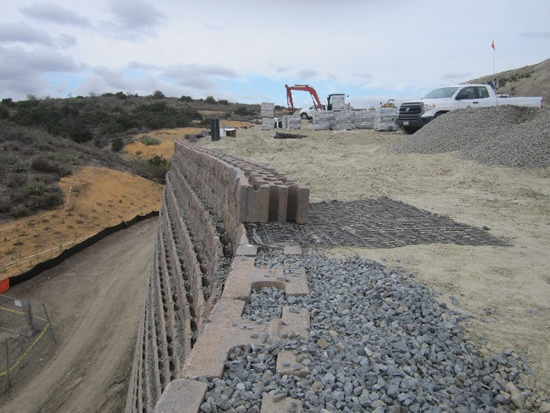 The Use of Secondary Geogrid Reinforcement in MSE Walls