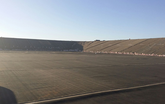 Geomembrane Wrinkles, Bridging, and Ballasting during Installation