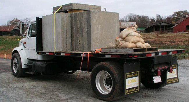 Photo of truck loaded with weight for the full-scale trafficking test procedure
