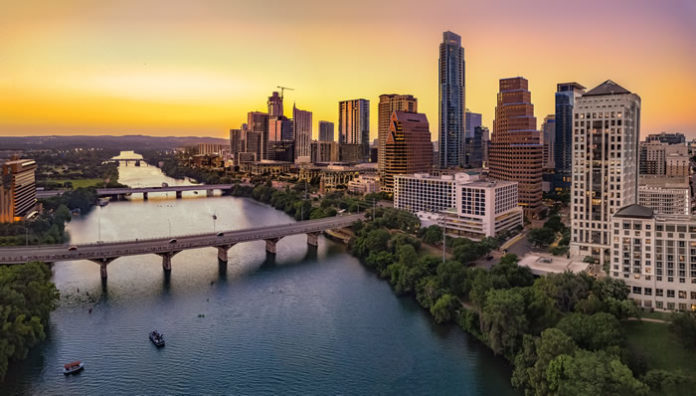 Austin Texas skyline in the evening and bluehour, by jdross75 via Shutterstock license